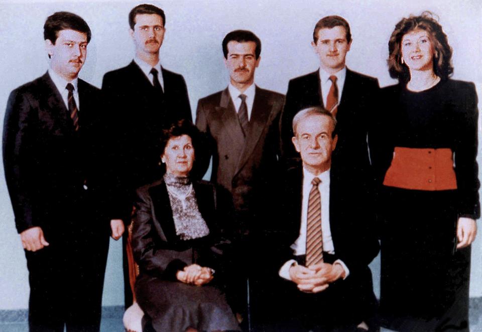 Hafez al-Assad seated and the rest of his family - with Bashar on the second left.