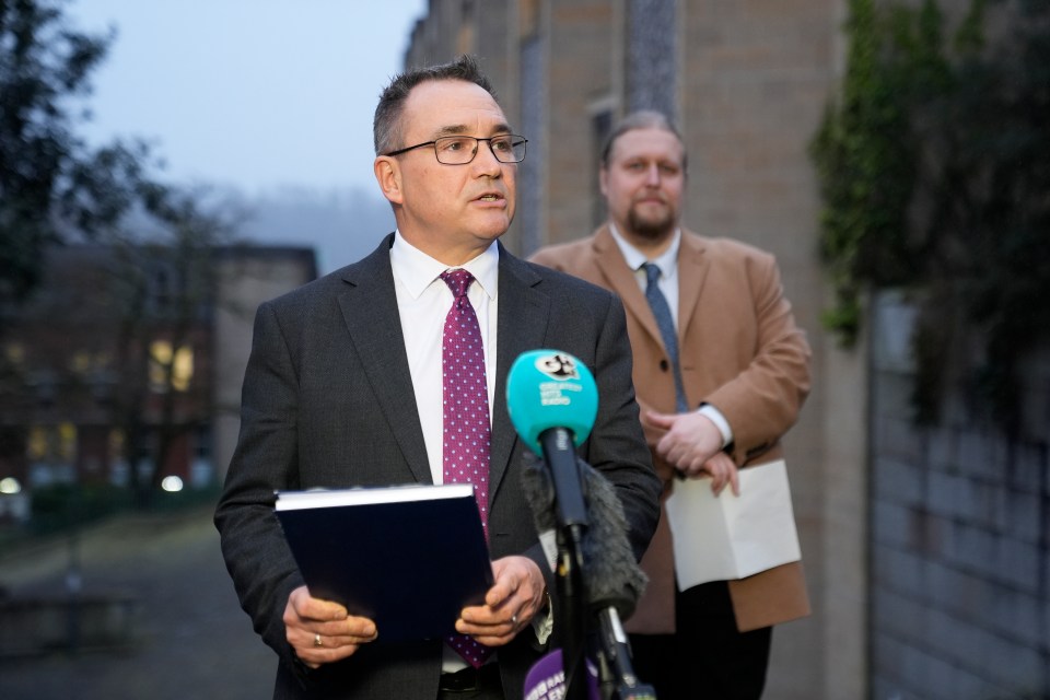 Detective Inspector Mark Jenkins of Dorset Police, watched by Benjamin May senior Crown Prosecutor with CPS Wessex