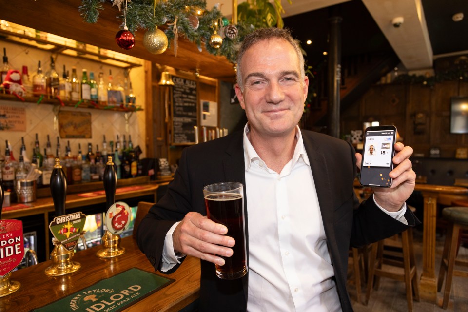 Technology Secretary Peter Kyle shows off his digital ID