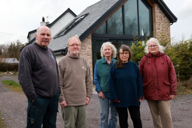 NO PLANNING PERMISSION ..Local Neigbours (L-R) .Iain Burden, Michael Sharp Linda Jeavons, Jean Williamson and Janet Gayther ..Locals are angry about this new building that's been built without planning permission.In Caernarfon, Wales...NINTCHDBJOBS000001102601..Copyright:.Dan Jones Images.dan@danjonesimages.co.uk.07939439200..17/12/2024