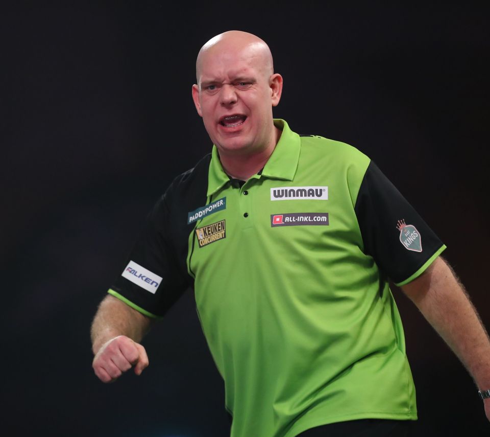 Michael van Gerwen reacting during a darts match.