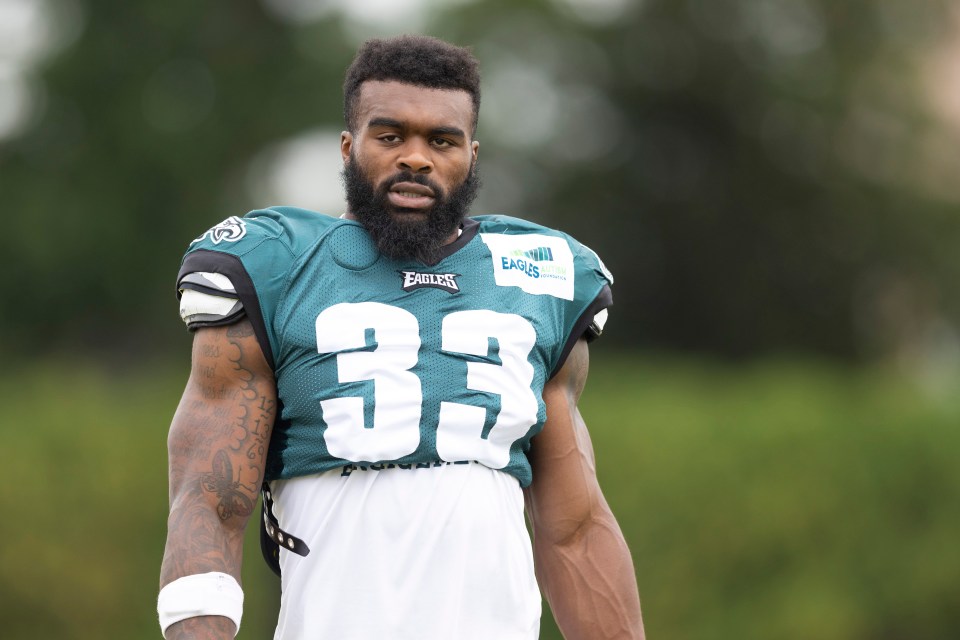 Elijah Holyfield, wearing a Philadelphia Eagles jersey, number 33.