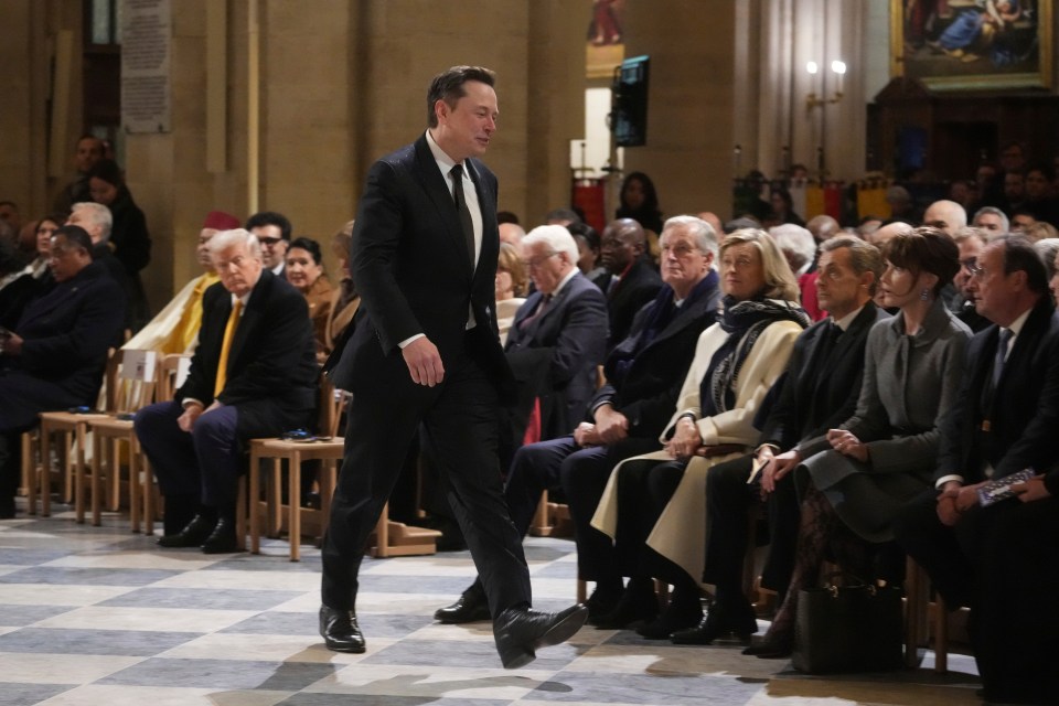 Donald Trump looks as his political ally Elon Musk arrives at Notre Dame Cathedral