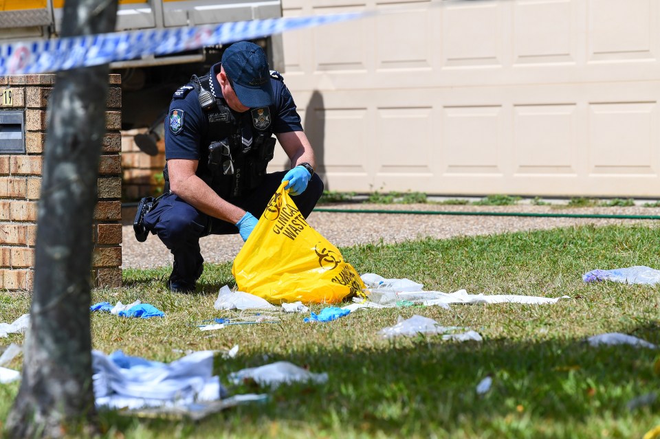 Police are seen at the scene of the fatal incident in the suburb of Northlakes, near Brisbane, Australia