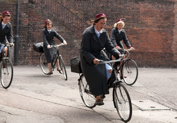 Four midwives on bicycles.