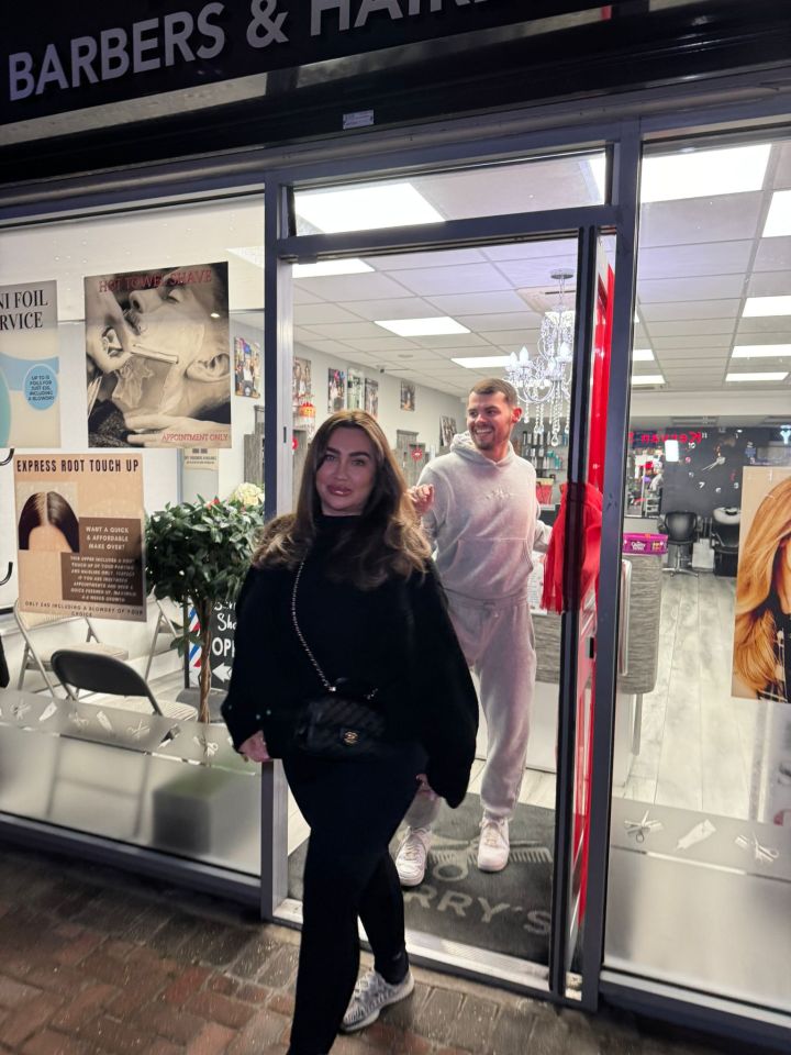 Lauren Goodger and a man leaving a hair salon.