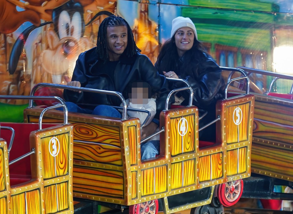 Nathan Aké grinned on a little roller coaster