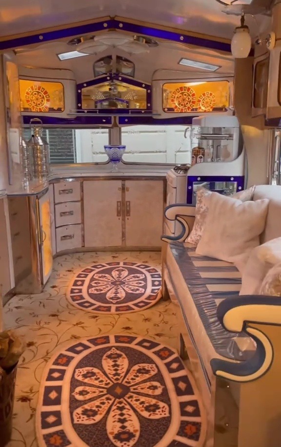 Interior of a lavishly decorated caravan.