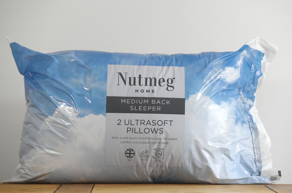 Package of two Nutmeg Home ultrasoft pillows for medium back sleepers.