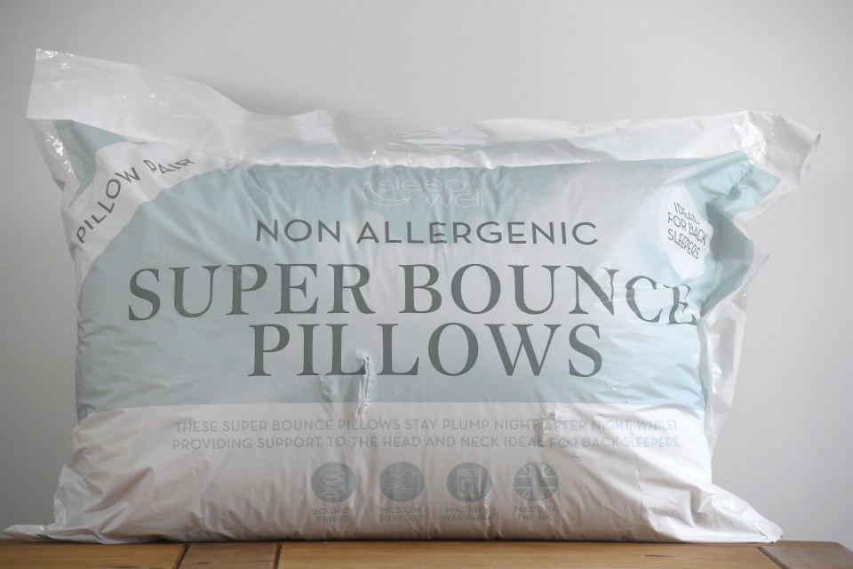 Pair of non-allergenic super bounce pillows, ideal for back sleepers.