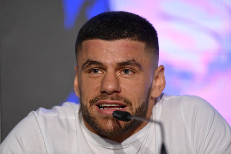 Boxer Florian Marku at a press conference.