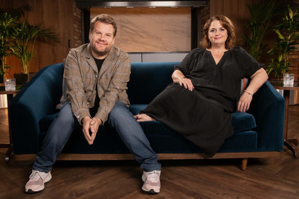 James Corden and Ruth Jones sitting on a couch.