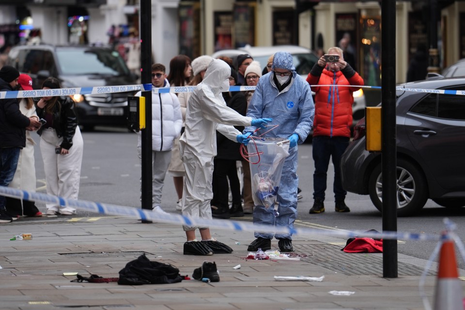 Forensic investigators collecting evidence at a crime scene.