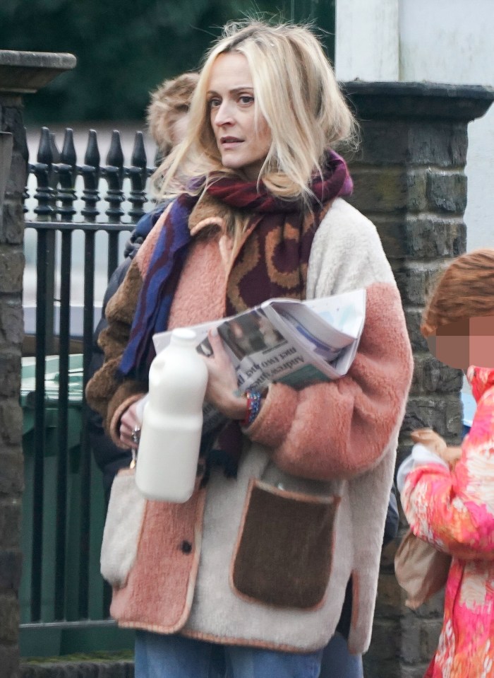 The doting mum picked up milk and a paper from a local shop