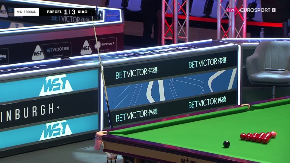 Luca Brecel's cue left on the snooker table during a mid-session break at the Scottish Open.