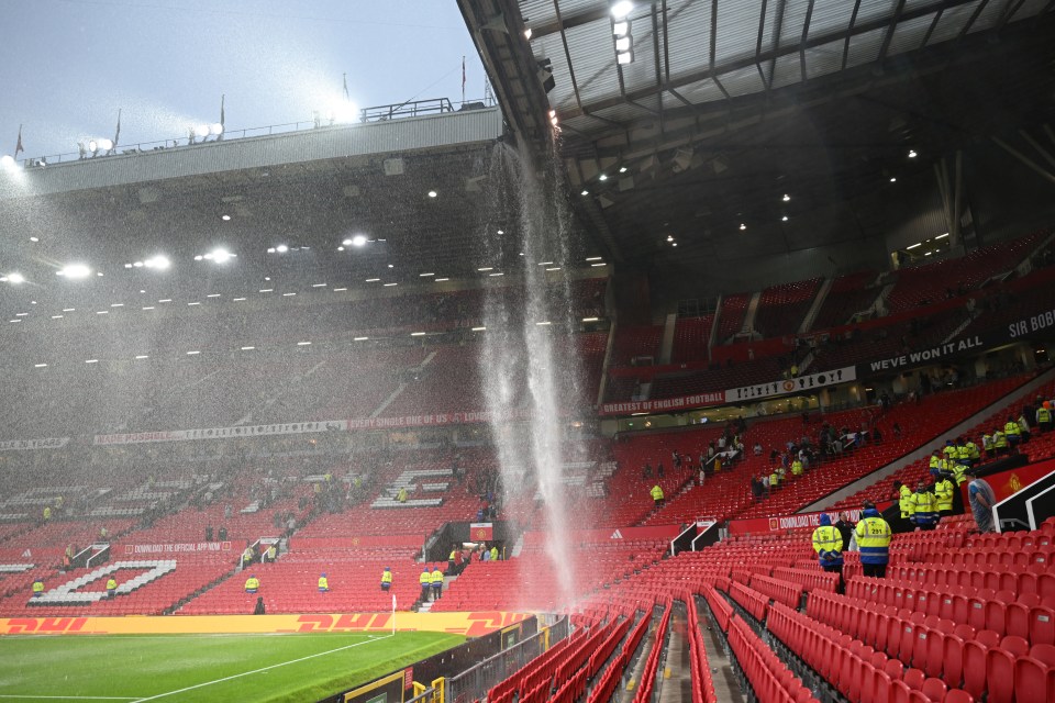 Water leaking from Old Trafford stadium roof onto seats below.