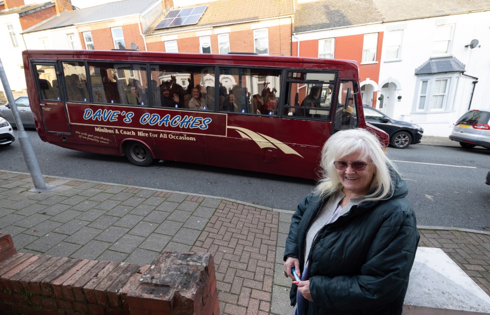 A Gavin & Stacey tour bus arrives outside Glenda's home