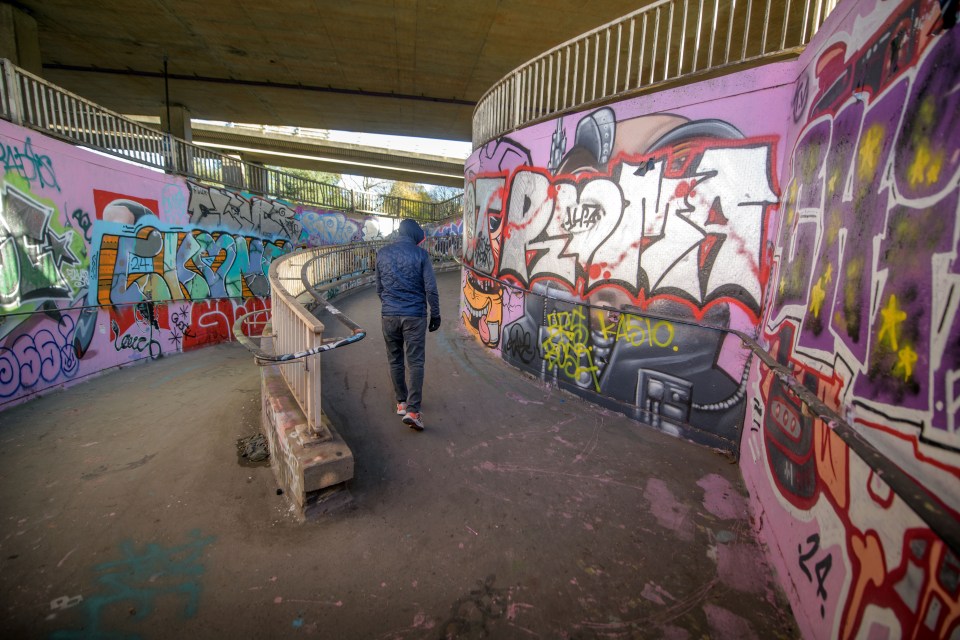 Beneath the motorway flyover near the Fishponds junction is a dimly lit concrete area covered in spray-painted “tag” names, which is almost a no-man’s land between the gangs