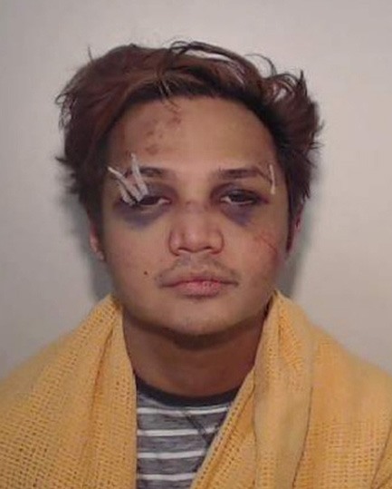 A police mugshot showed Sinaga after his arrest in 2017