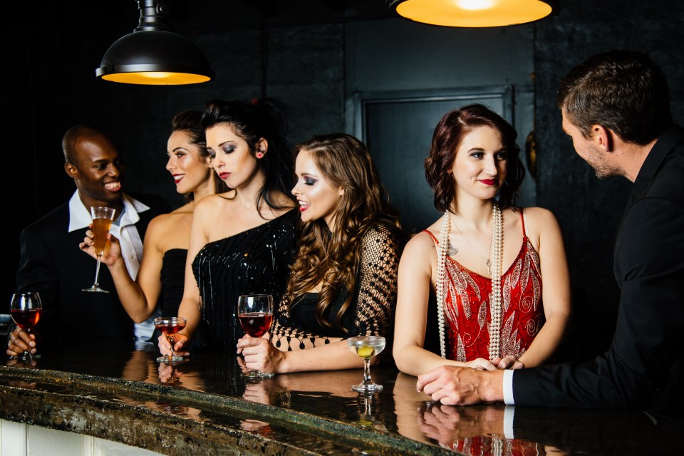 Men race to the bar to impress women in what is a modern mating ritual, researchers have found