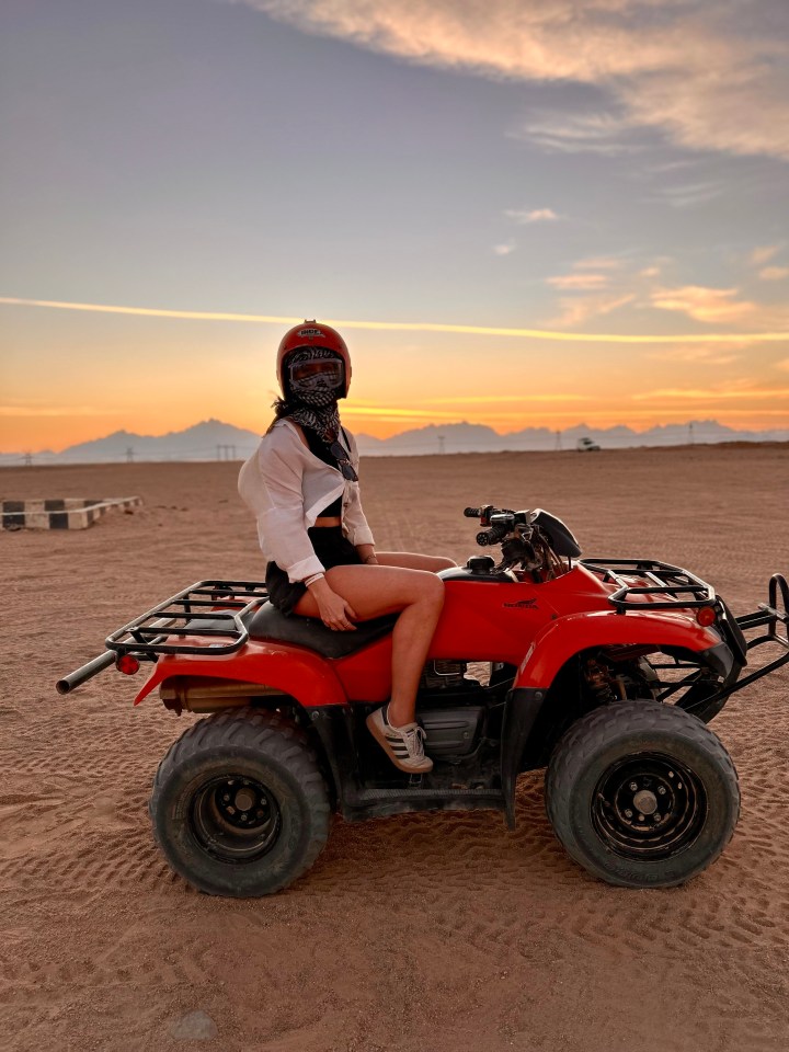 Hayley drives a quad bike to Bedouin village