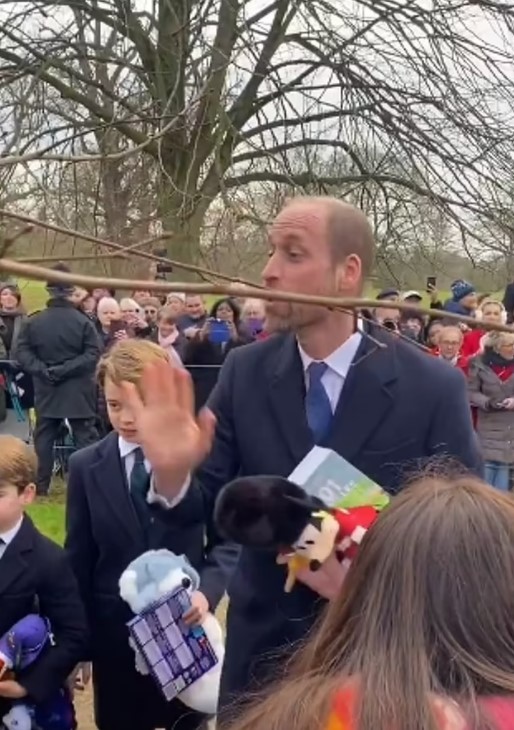 Prince William tells a young fan to keep their Christmas chocolates.