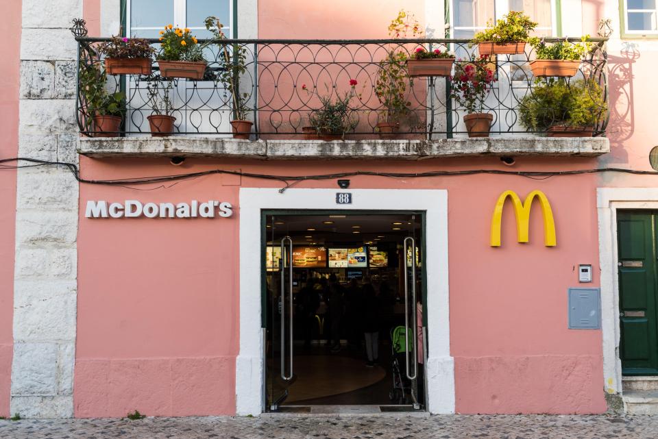 HGJCX2 the entrance to a McDonald’s restaurant established in a traditional home in Lisbon, Portugal