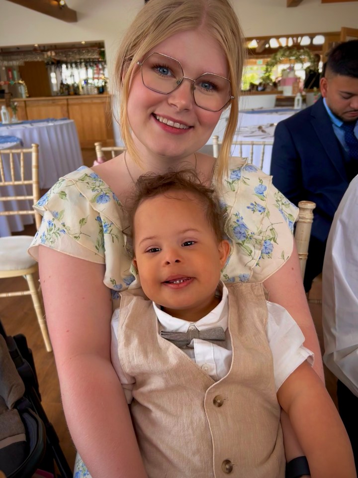 Shellie Warner, 27, with her son Adonis, known as Donny, who will be getting rewrapped birthday presents for Christmas