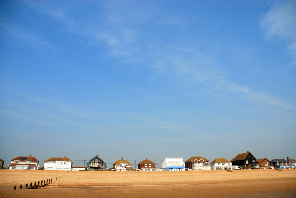 Houses overlooking Camber Sands, one of the UK's best-loved beaches