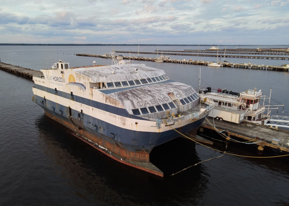 Abandoned casino cruise ship docked in Florida.