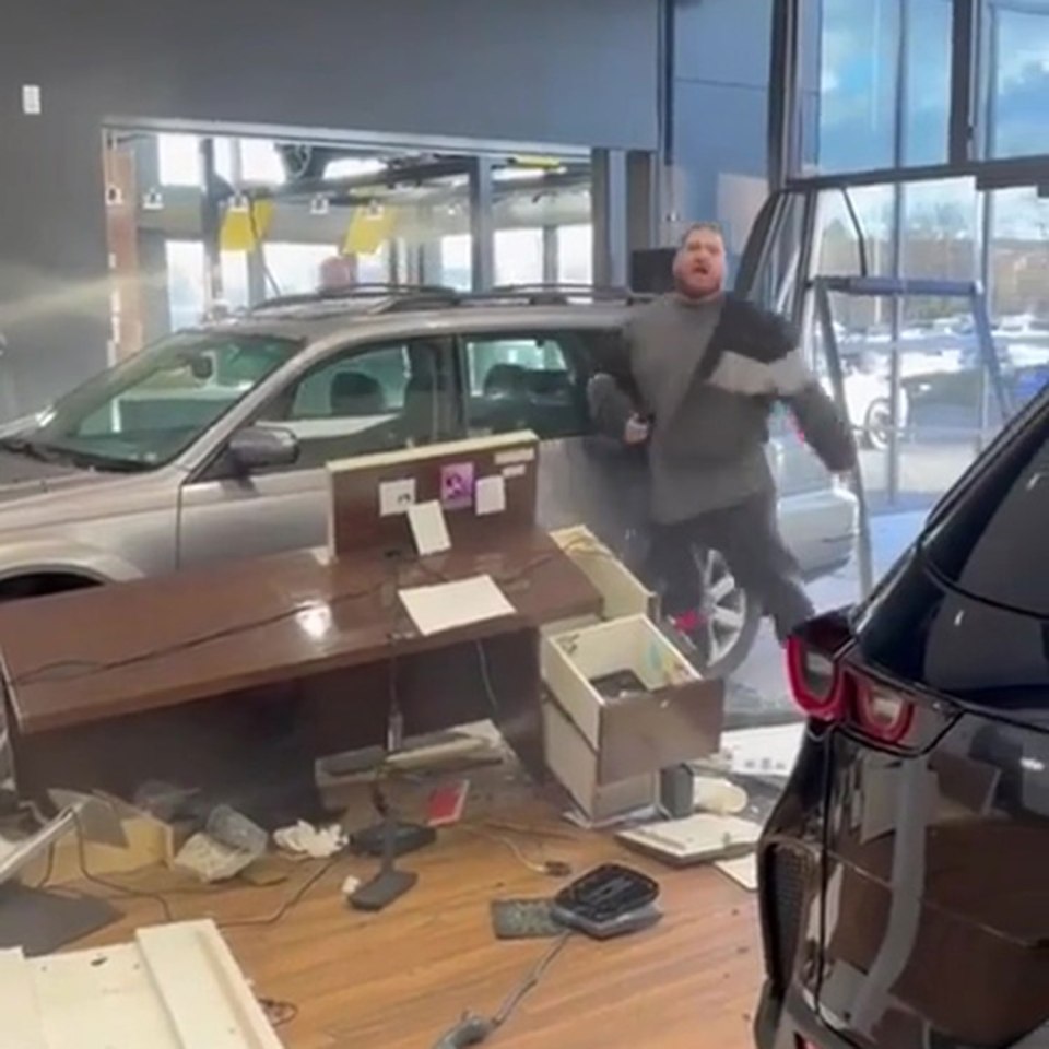 The furious driver comes out and begins to shout at staff as the shop around him is seen completely destroyed