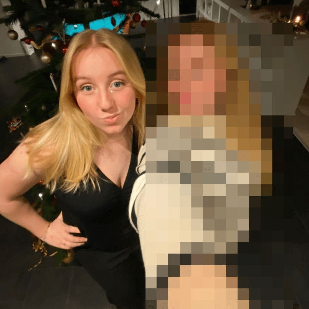 A blonde woman in a black dress poses with a friend whose face is pixelized.