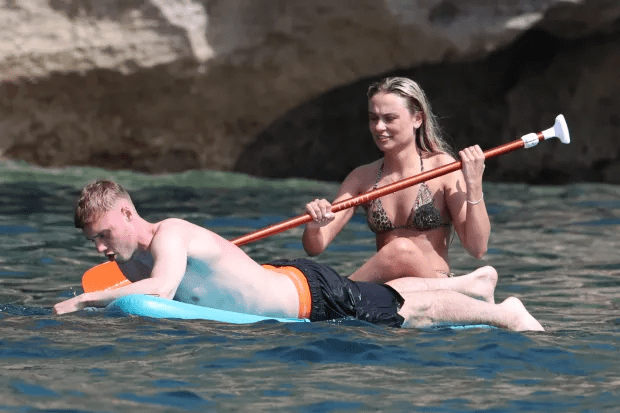 Cole and Connie pictured paddleboarding in July 2024