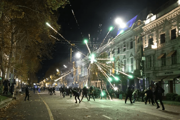 Protesters shot fireworks at violent police in fierce clashes