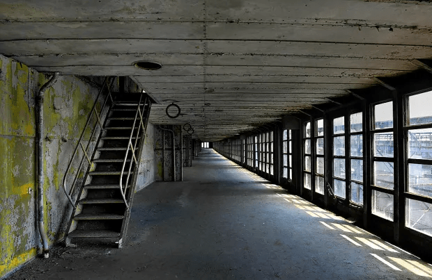 The covered First Class Promenade Deck of the SS United States is rusting away in Philadelphia