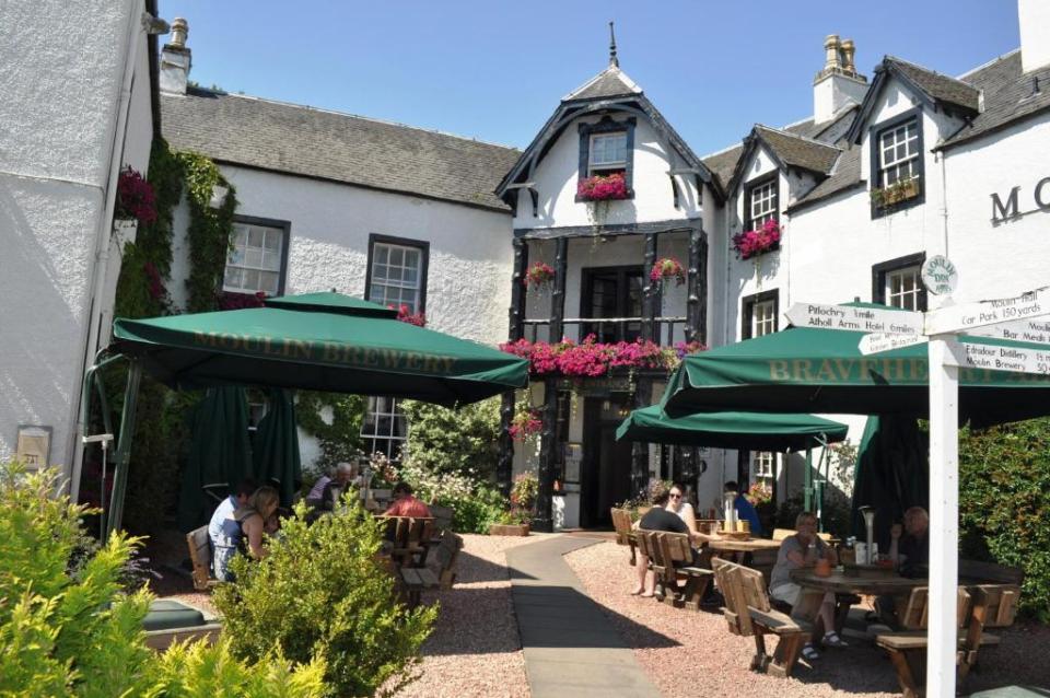 The inn at the Moulin Hotel, which has a traditional brewery and cosy fire