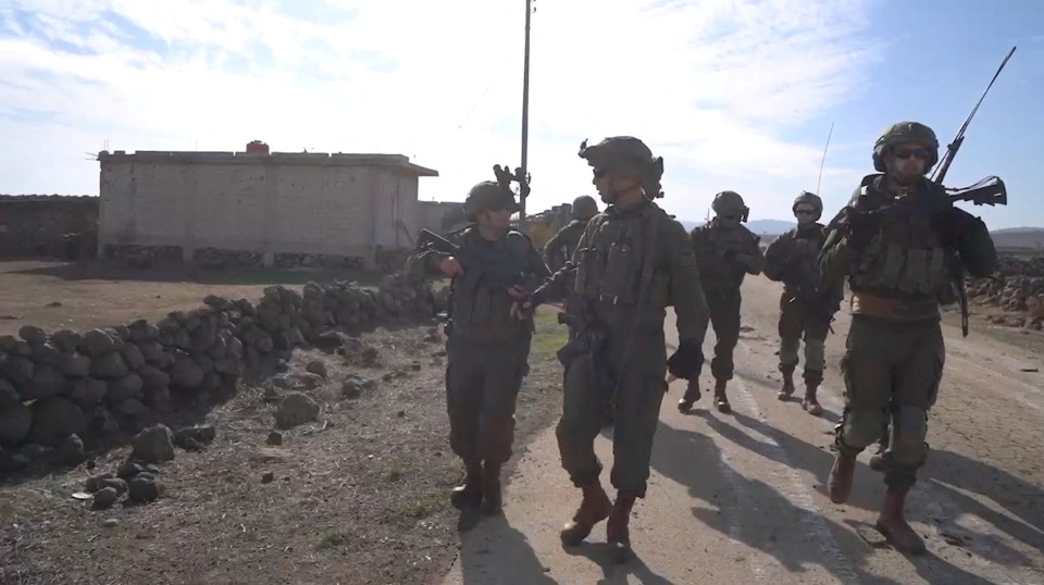 Israeli soldiers operate in an unknown location in Southern Syria on December 9