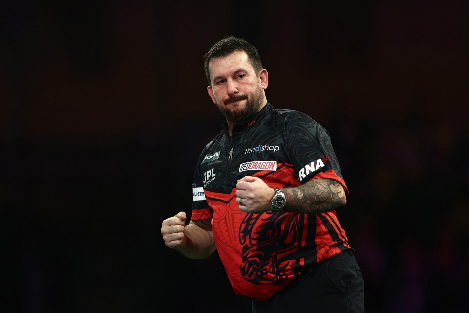 Jonny Clayton of Wales reacts during a darts match.