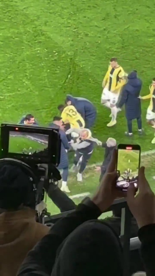 ‘The Special One’ yanked Zeki Murat Gol by his hood to lead him away from the celebrations