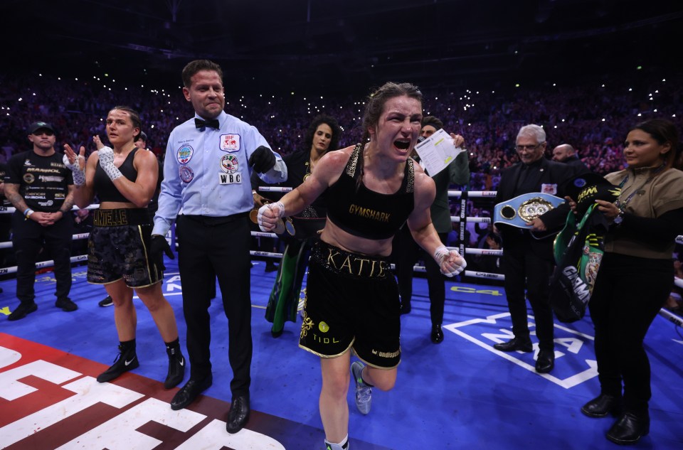 Katie Taylor celebrates her undisputed super-lightweight world title win.