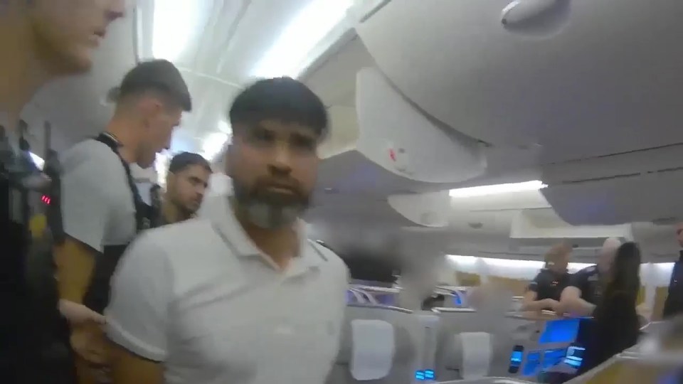 Urfan Sharif is arrested after landing at Gatwick last year