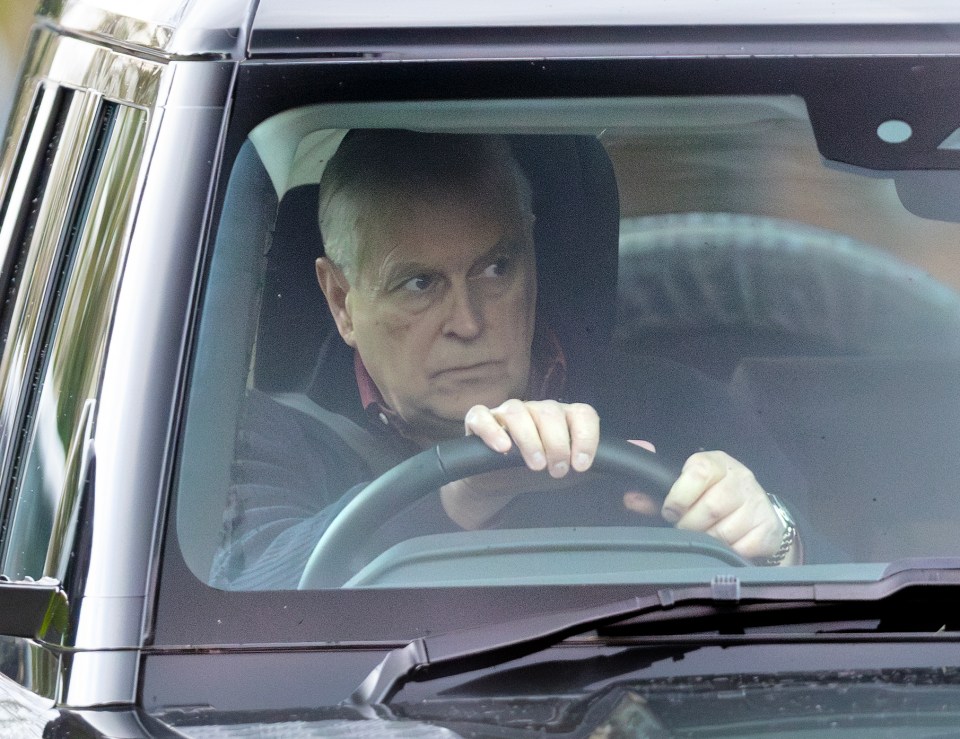 Prince Andrew driving away from Sandringham.