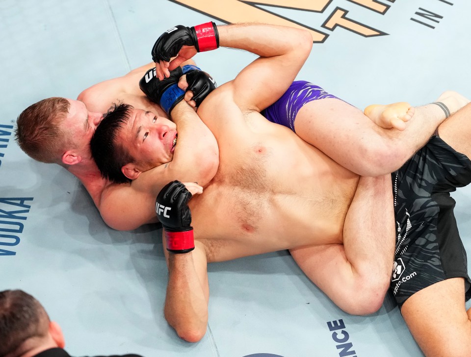 Garry came close to finishing Rakhmonov with a fifth-round rear-naked choke