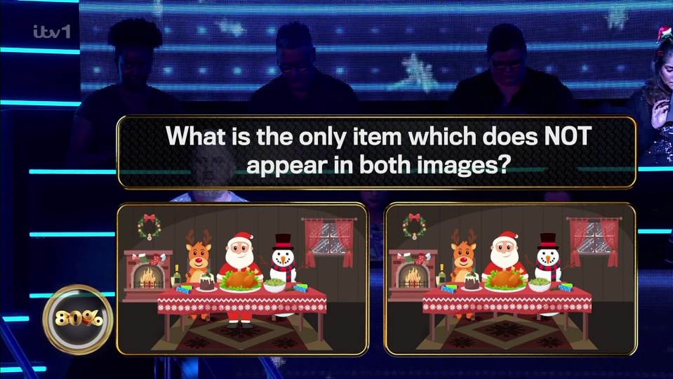 The answer was Santa's legs were missing in the second image