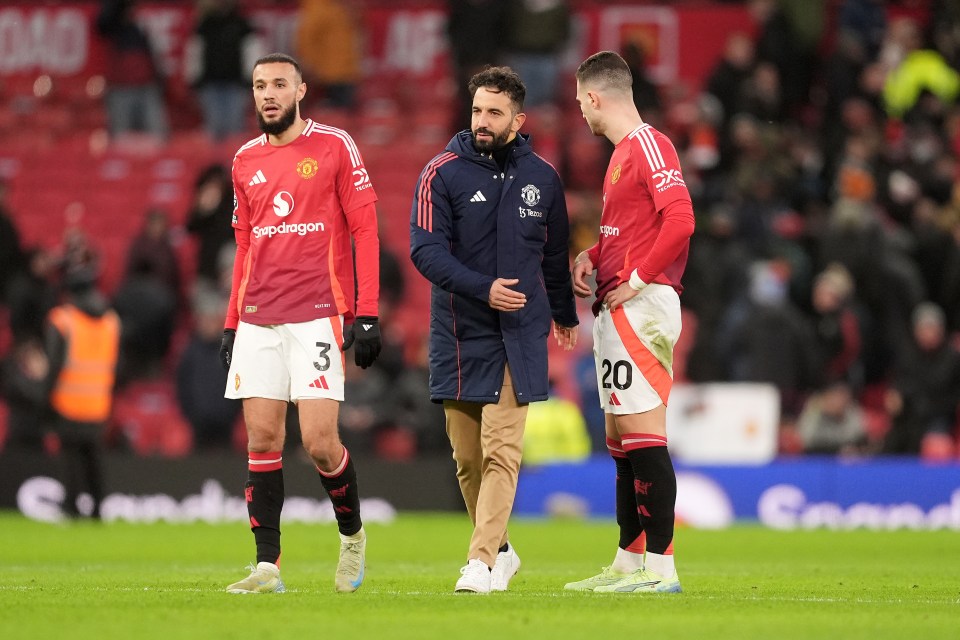 Manchester United manager and players looking dejected after a match.