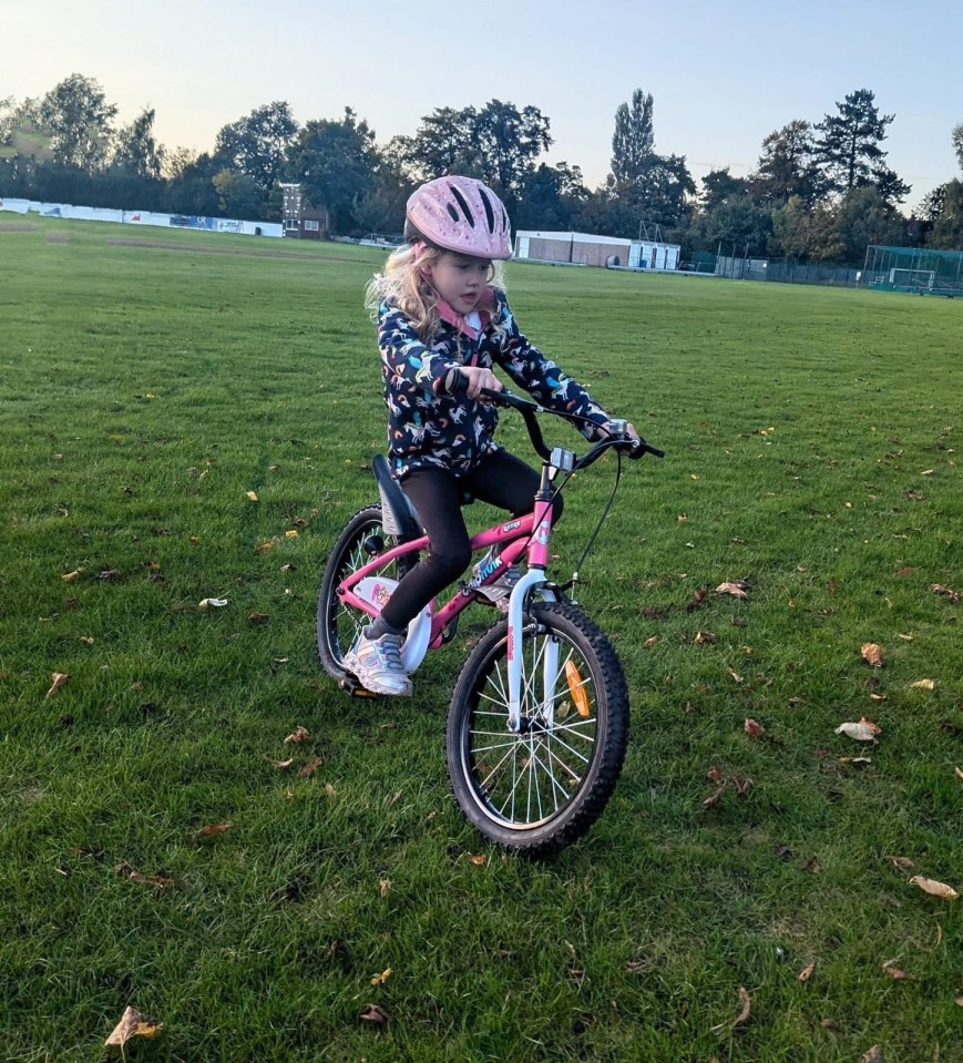 Miley, now 5, has just learned how to ride her bike