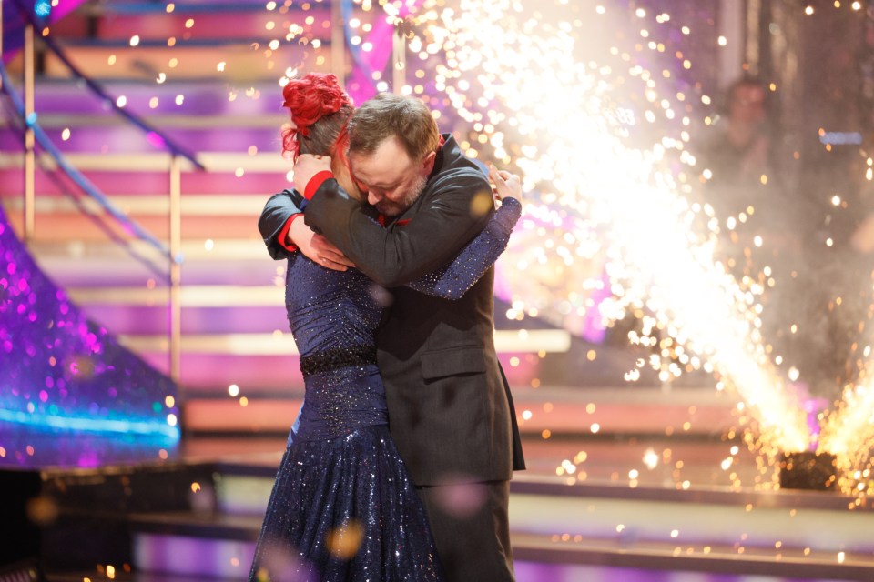 Chris McCausland and Dianne Buswell embrace on Strictly Come Dancing.