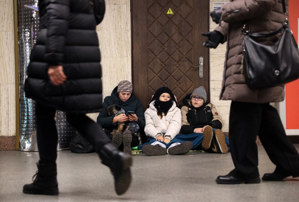 Civilians sheltering in a Kyiv metro station during an air raid.