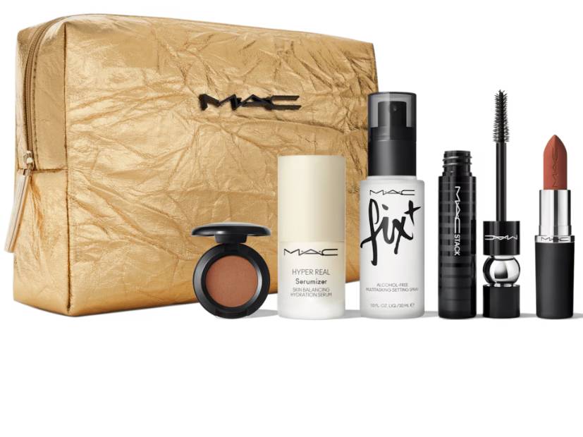 MAC makeup set in gold cosmetic bag.