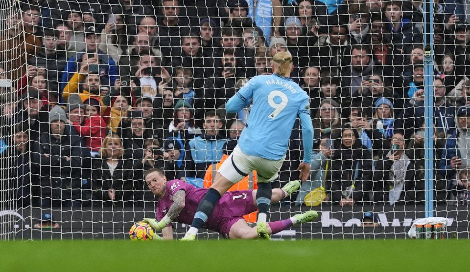 Erling Haaland's penalty kick being saved by Jordan Pickford.